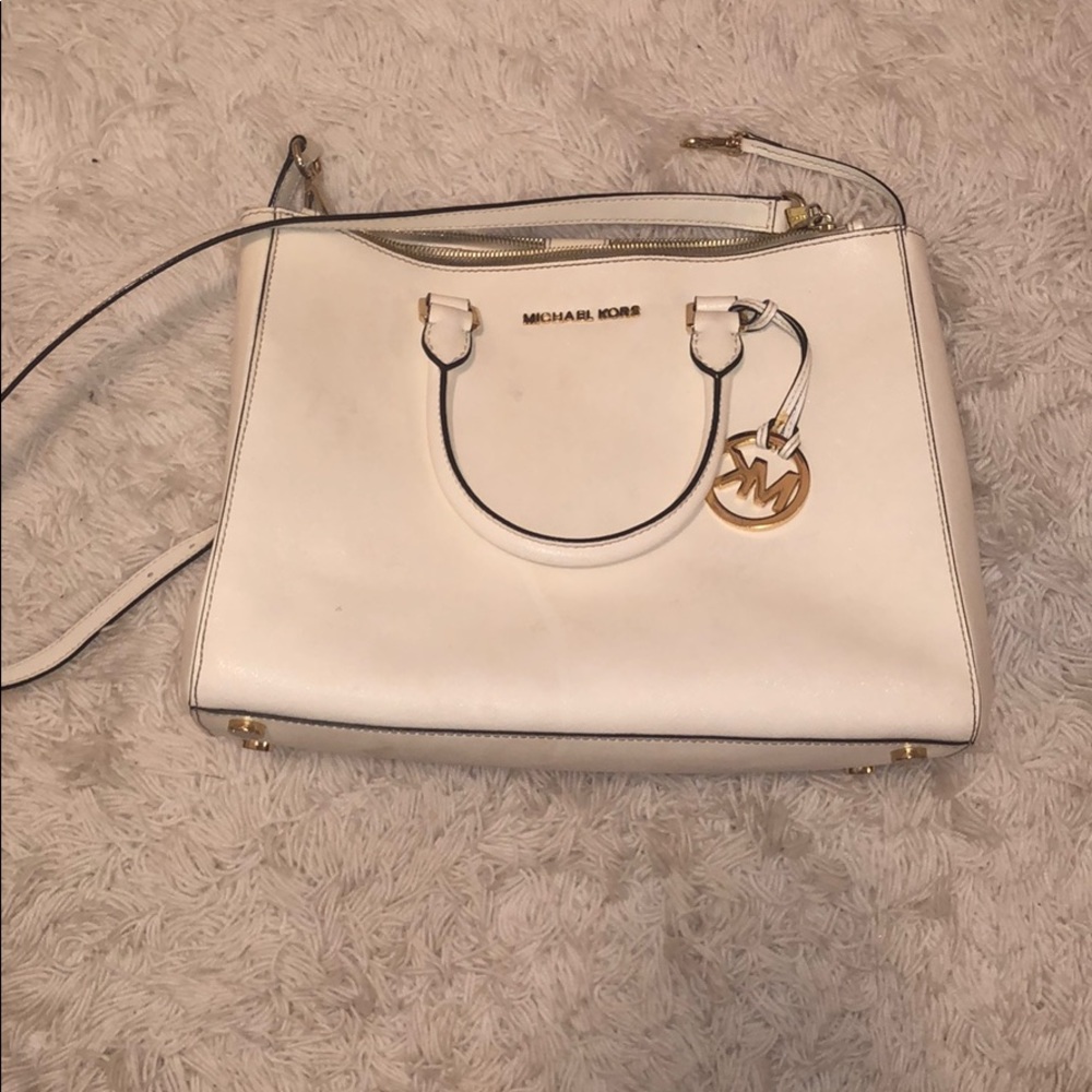 MK bag FREE w/ $300 purchase!